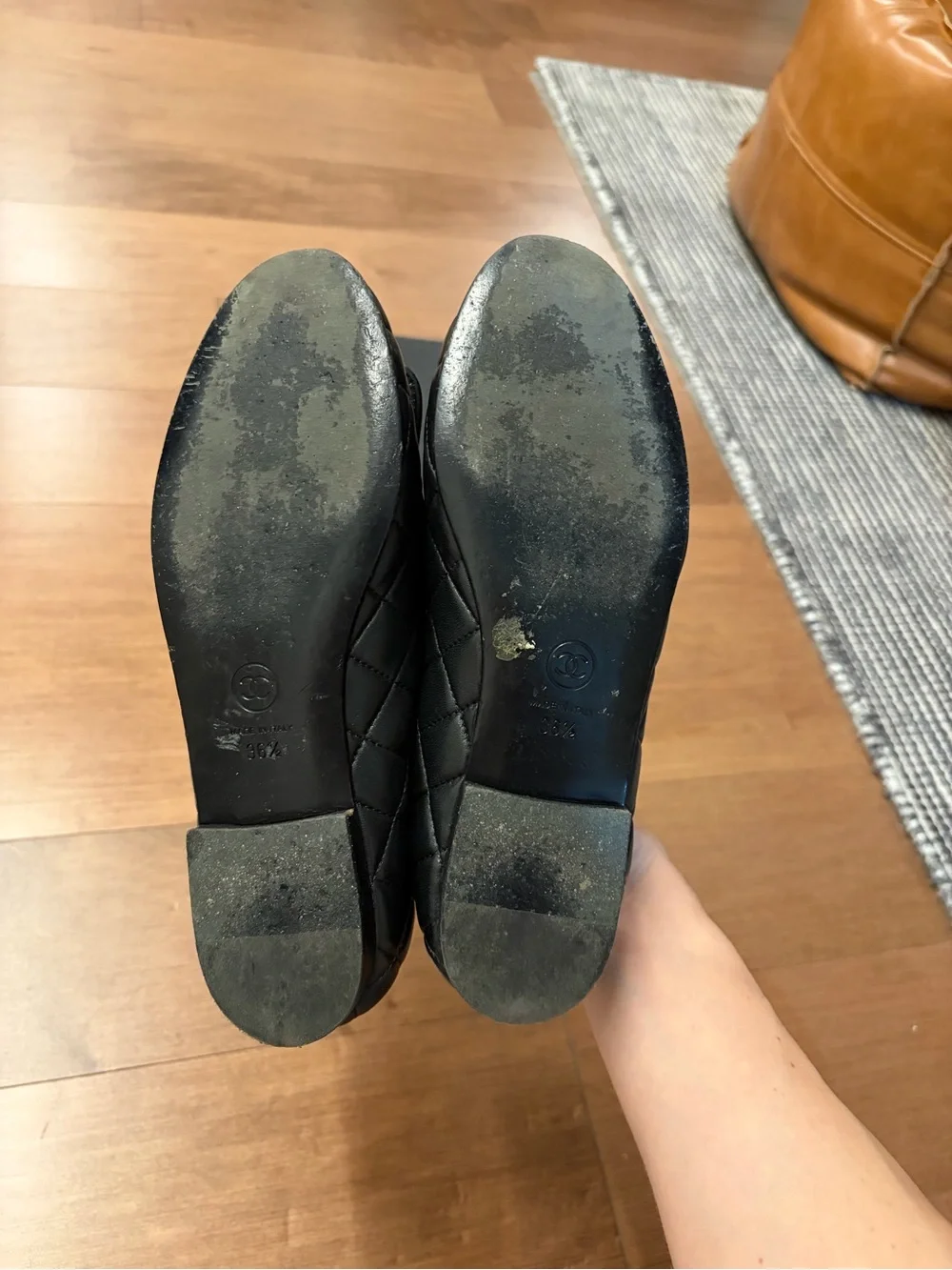 CHANEL Black Quilted Leather Ballet Flats with Gold CC Plaque